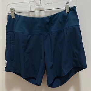 Oiselle navy long roga shorts